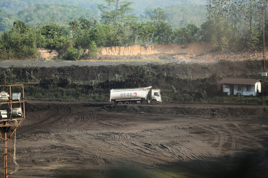 A truck operates at a coal mine near Samarinda, East Kalimantan, Indonesia, on Aug. 19, 2026. (AP Photo/Ahmad Mulia Panjaitan)