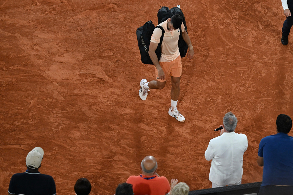 Novak Djokovic of Serbia leaves the court after the third round men's singles tennis match against Joao Fonseca of Brazil at the French Open tennis tournament in Paris, Friday, May 29, 2026. (AP Photo/Emma Da Silva)
