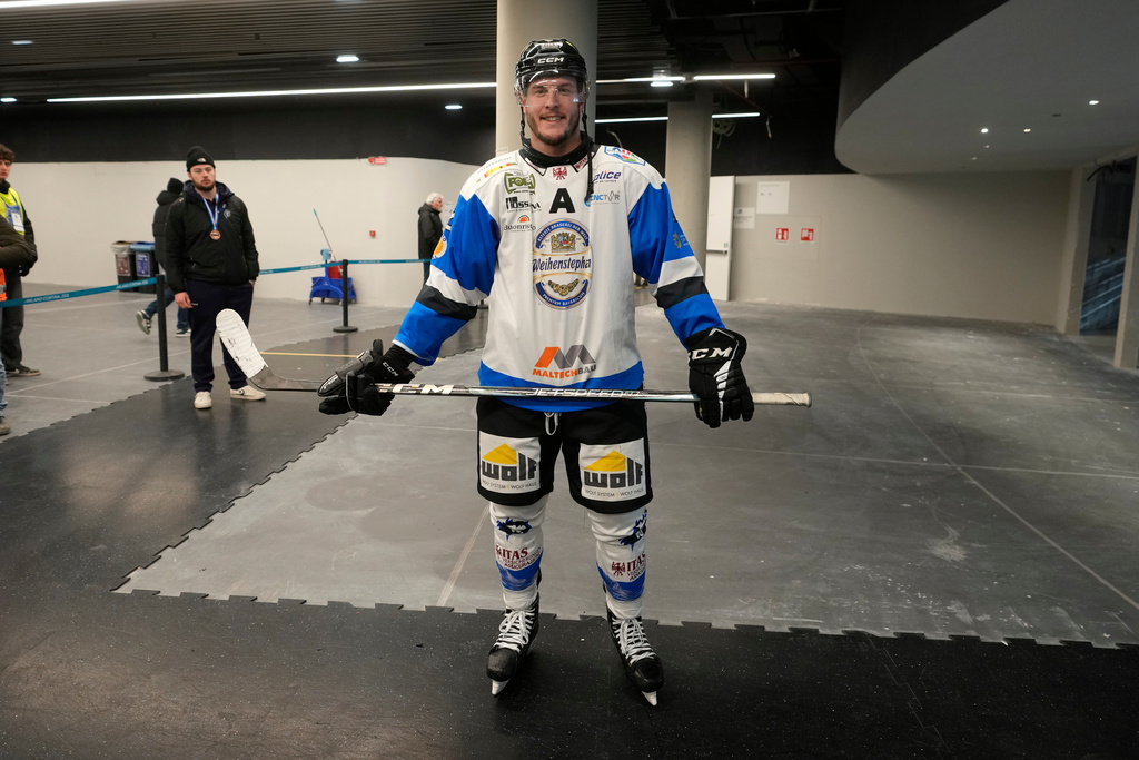 Wipptal Broncos Canadian player James Livingston poses at the Santa Giulia Ice Hockey Arena, in Milan, where Ice Hockey discipline of the Milan Cortina 2026 Winter Olympics will take place, in Milan, Italy, Sunday, Jan. 11, 2026. (AP Photo/Luca Bruno)