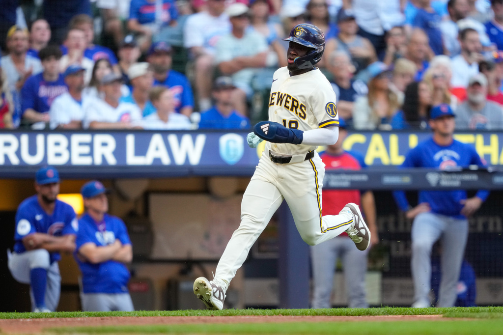 Milwaukee Brewers' Luis Lara scores on an RBI single hit by Garrett Mitchell during the fifth inning of a baseball game against the Chicago Cubs Monday, Sept. 7, 2026, in Milwaukee. (AP Photo/Kayla Wolf)