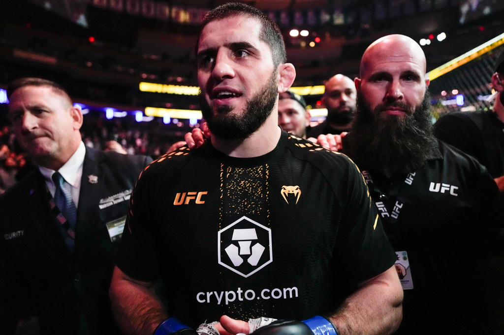 FILE - Russia's Islam Makhachev leaves a welterweight title bout after defeating Australia's Jack Della Maddalena at the UFC 322 mixed martial arts event, Saturday, Nov. 15, 2025, in New York. (AP Photo/Yuki Iwamura, file)