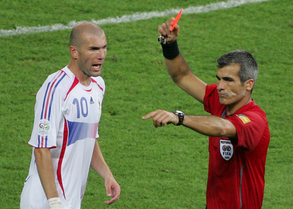 FILE - Referee Horacio Elizondo shows the red card to France's Zineidine Zidane during the final of the soccer World Cup between Italy and France in the Olympic Stadium in Berlin, on July 9, 2006. (AP Photo/Michael Probst, File)