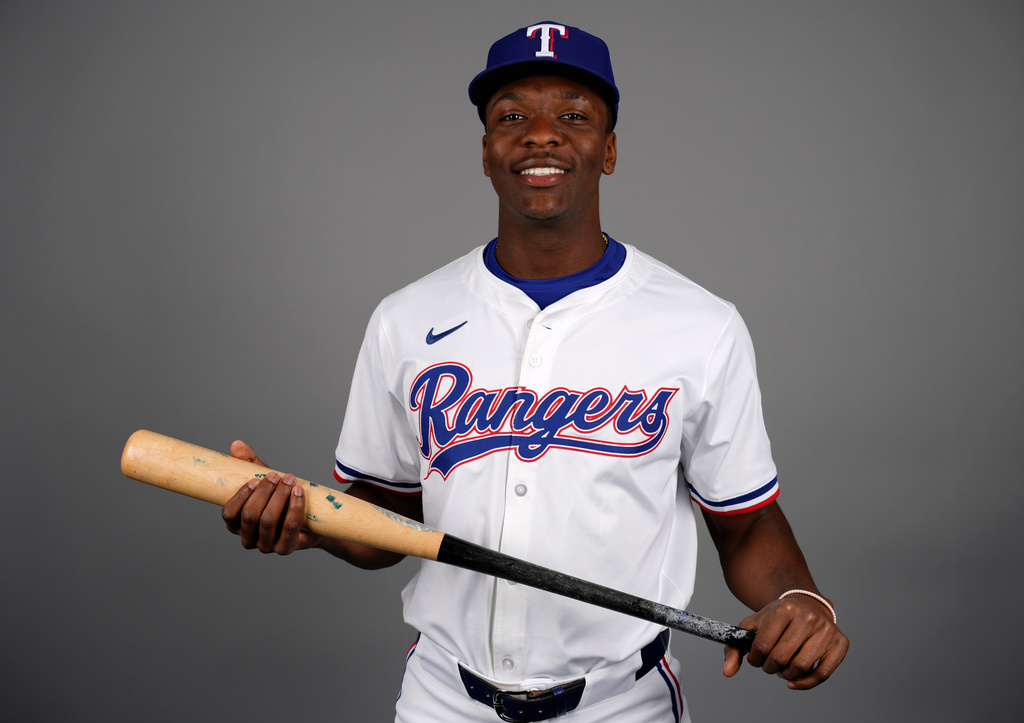 FILE - This is a 2025 photo of Sebastian Walcott of the Texas Rangers baseball team. This image reflects the Texas Rangers' active roster as of Wednesday, Feb. 19, 2025, when this image was taken in Surprise, Ariz. (AP Photo/Carolyn Kaster, File)