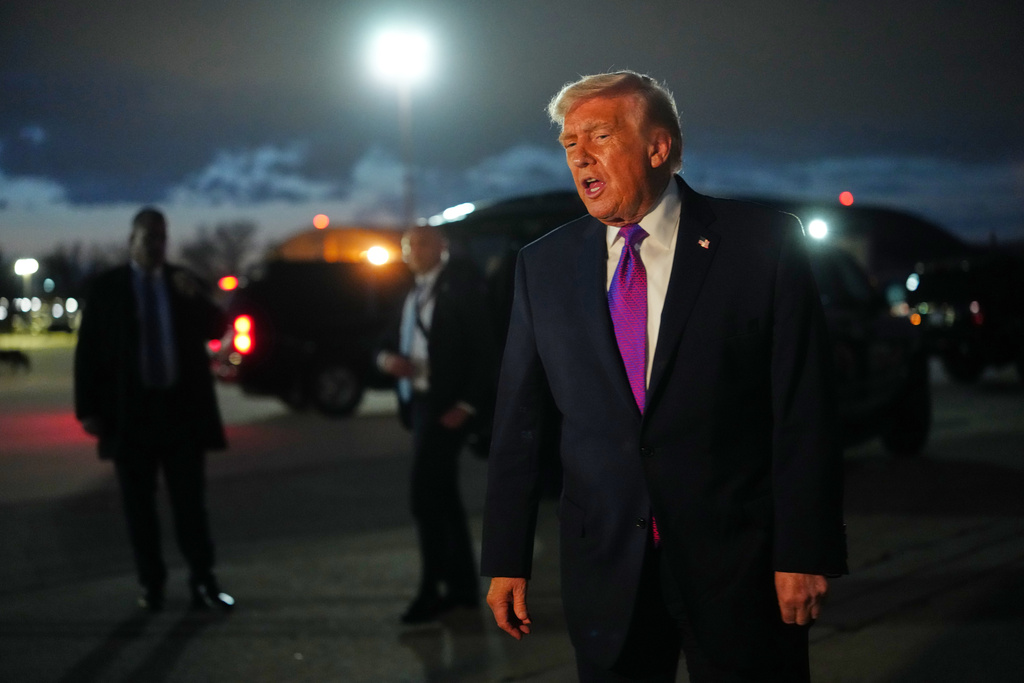 President Donald Trump speaks to reporters after arriving on Air Force One, Wednesday, March 11, 2026, at Joint Base Andrews, Md. (AP Photo/Julia Demaree Nikhinson)