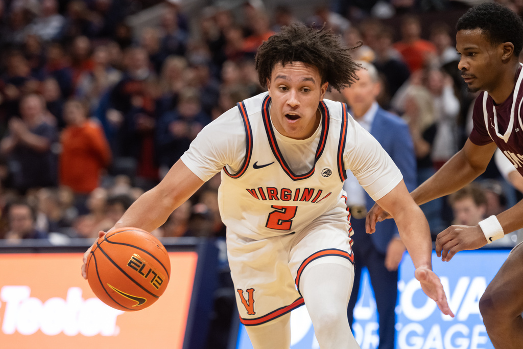 Virginia guard Chance Mallory (2) drives the ball against Maryland-Eastern Shore during the second half of an NCAA college basketball game, Tuesday, Dec. 9, 2025, in Charlottesville, Va. (AP Photo/Robert Simmons)