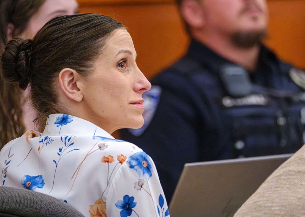 Defendant Kouri Richins, left, accused of poisoning her husband in March 2022, listens to closing arguments in Third District Court, Monday, March 16, 2026, in Park City, Utah. (David Jackson/Pool Photo via AP)
