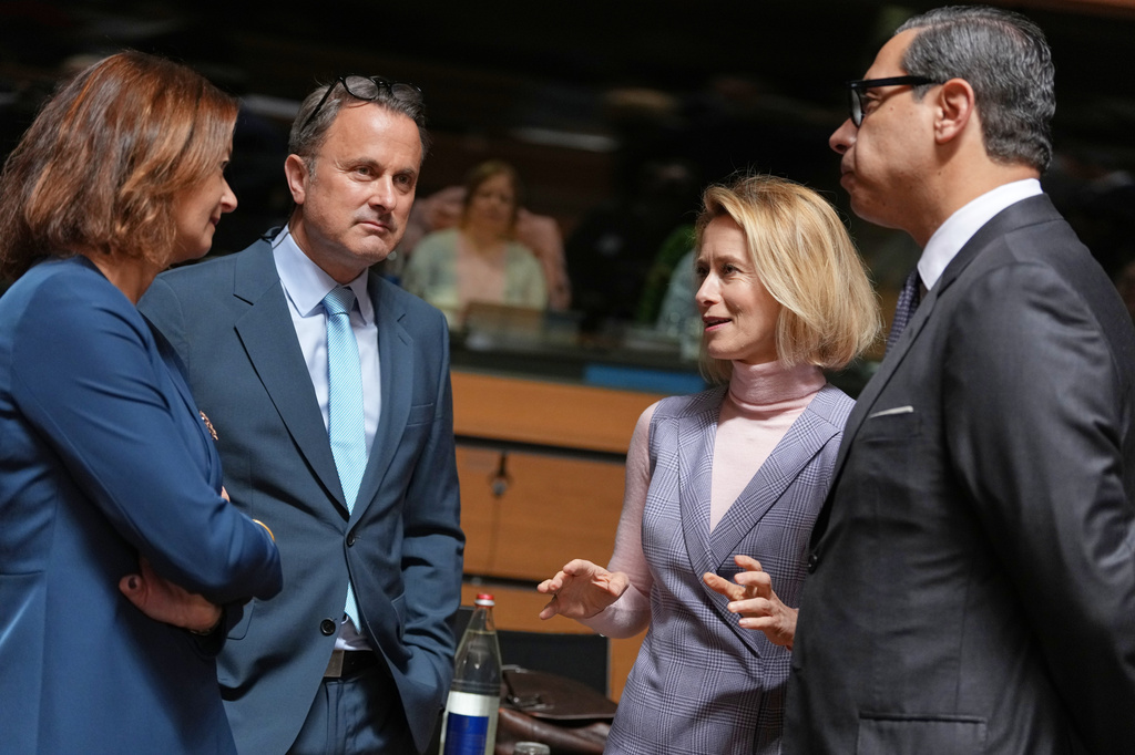 European Union foreign policy chief Kaja Kallas, second right, speaks with from left, Slovenia's Foreign Minister Tanja Fajon, Luxembourg's Foreign Minister Xavier Bettel and Cypriot Foreign Minister Constantinos Kombos during a round table meeting of EU foreign ministers at the European Council building in Luxembourg, Tuesday, April 21, 2026. (AP Photo/Virginia Mayo)