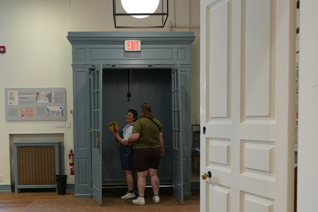 Quakers leave after Sunday worship in the historic West Room of the Arch Street Meeting House in Philadelphia on Oct. 5, 2025. (AP Photo/Luis Andres Henao)