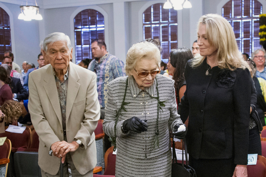 FILE - Former Hawaii Gov. George Ariyoshi, left, and and Princess Abigail Kawananakoa, center, arrive before oral arguments at the Hawaii State Supreme Court in Honolulu, Aug. 27, 2015. (Craig T. Kojima/Honolulu Star-Advertiser via AP, Pool, File)