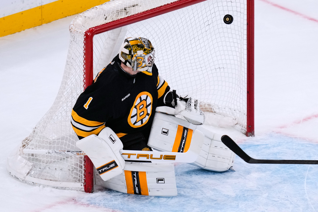 Boston Bruins goaltender Jeremy Swayman (1) looks back at the puck on a goal by Montreal Canadiens' Sammy Blais during the first period of an NHL hockey game, Tuesday, Dec. 23, 2025, in Boston. (AP Photo/Charles Krupa)