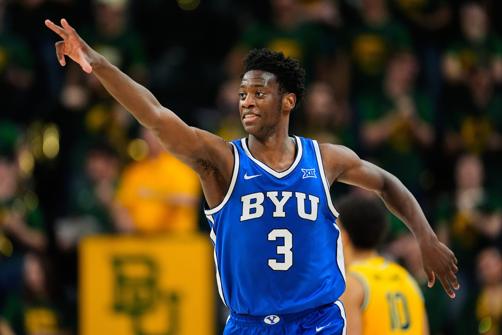 FILE - BYU forward AJ Dybantsa celebrates his three-pointer in the second half of an NCAA college basketball game against Baylor Tuesday, Feb. 10, 2026, in Waco, Texas. (AP Photo/Tony Gutierrez, File)