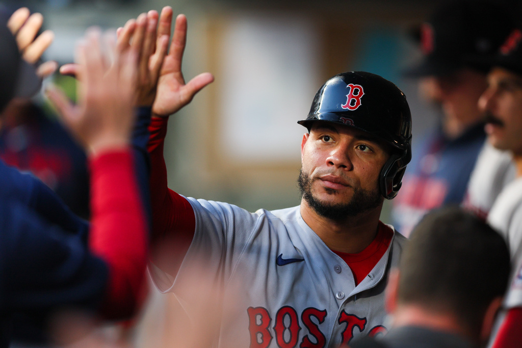 Boston Red Sox's Willson Contreras celebrates after scoring on a single hit by Caleb Durbin in the sixth inning of a baseball game against the Seattle Mariners, Saturday, June 20, 2026, in Seattle. (AP Photo/Kevin Ng)