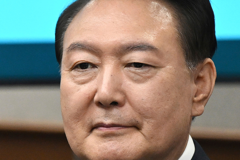 FILE - Then South Korea's ousted President Yoon Suk Yeol, who is facing charges of orchestrating a rebellion when he declared martial law on Dec. 3, attends his criminal trial at a courtroom of the Seoul Central District Court in Seoul Monday, April 21, 2025. (Jung Yeon-je/Pool Photo via AP, File)