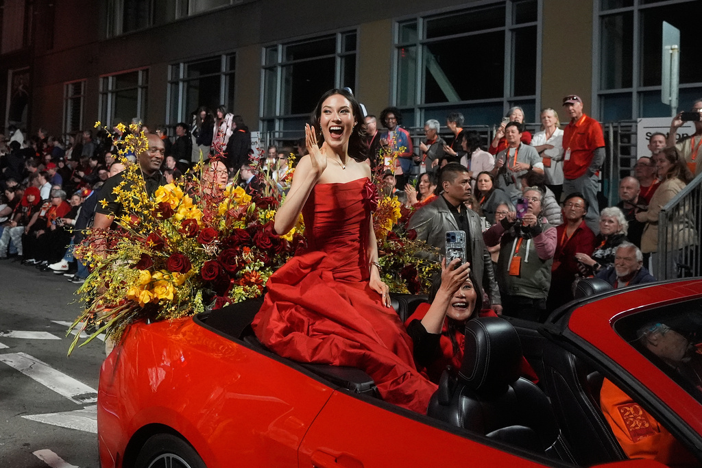 Olympic gold medalist and Grand Marhsal Eileen Gu waves during the Chinese New Year Parade in San Francisco, Saturday, March 7, 2026. (AP Photo/Jeff Chiu)