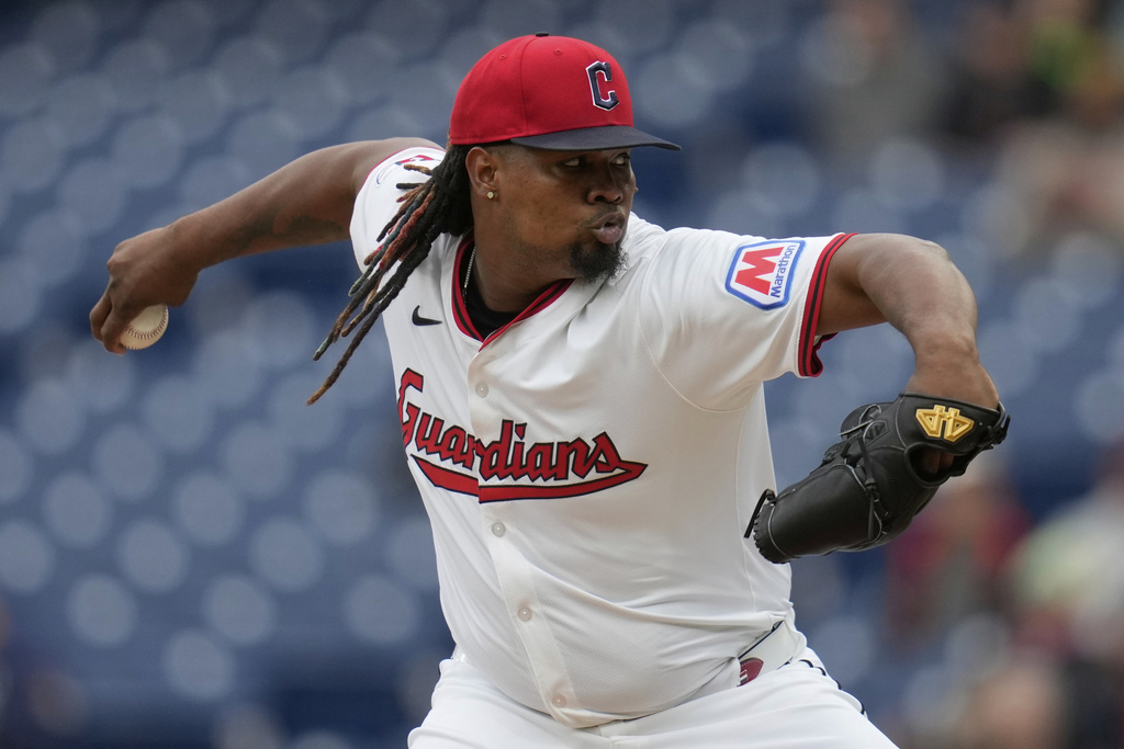 FILE - Cleveland Guardians' Luis Ortiz pitches in the first inning of a baseball game against the Minnesota Twins in Cleveland, April 30, 2025. (AP Photo/Sue Ogrocki, file)