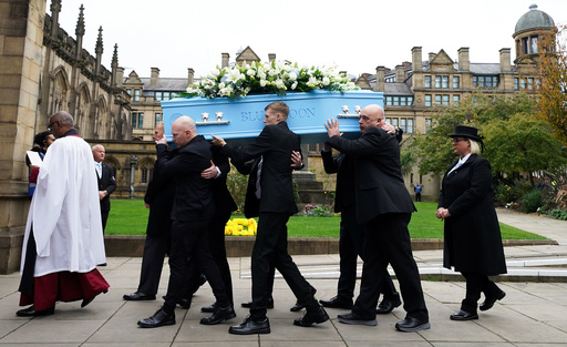 The coffin of Ricky Hatton is carried into Manchester Cathedral, in Manchester, England, Friday, Oct. 10, 2025. (Danny Lawson/PA via AP) The coffin of Ricky Hatton is carried into Manchester Cathedral, in Manchester, England, Friday, Oct. 10, 2025. (Danny Lawson/PA via AP)