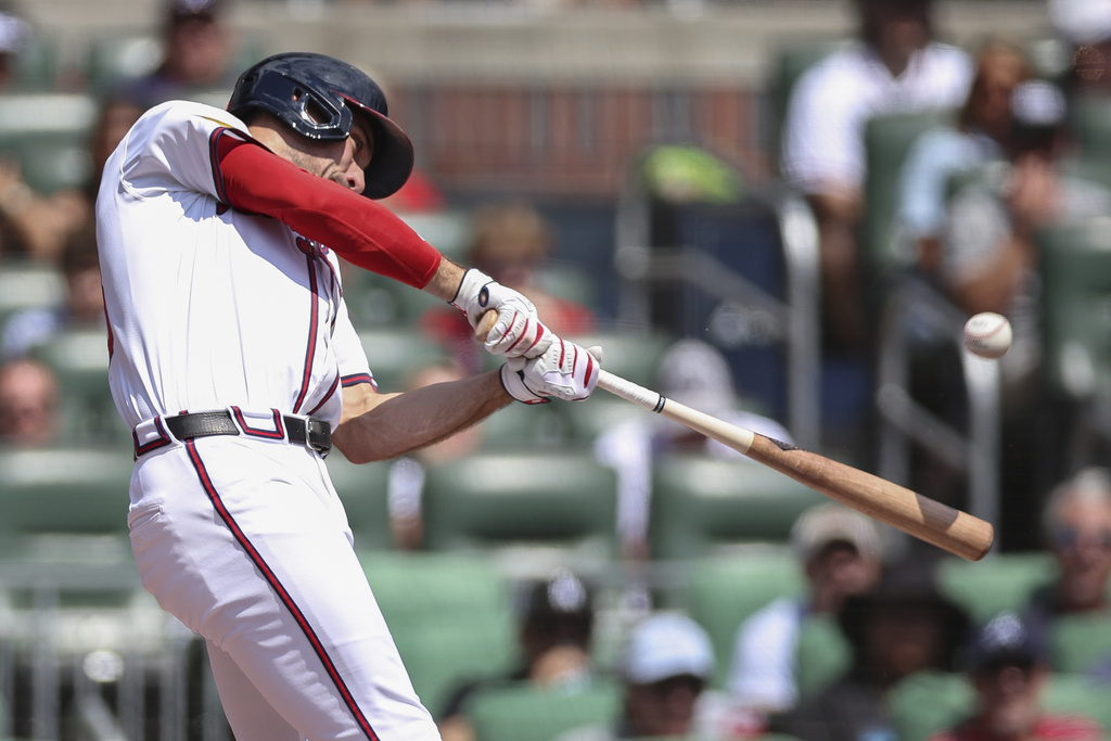 Atlanta Braves' Matt Olson hits a solo home run in the first inning of a baseball game against the Houston Astros, Sunday, Sept. 14, 2025, in Atlanta. (AP Photo/Colin Hubbard)