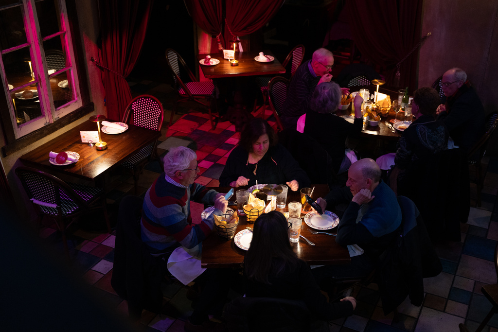 Diners eat at Cuba Libre Restaurant and Rum Bar in Philadelphia, on Friday, March 6, 2026. (AP Photo/Mingson Lau)