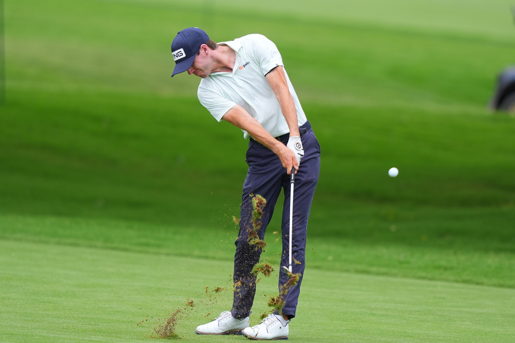 Alex Smalley hits from the ninth fairway during the first round of the Charles Schwab Challenge golf tournament at Colonial Country Club in Fort Worth, Texas, Thursday, May 28, 2026. (AP Photo/LM Otero)