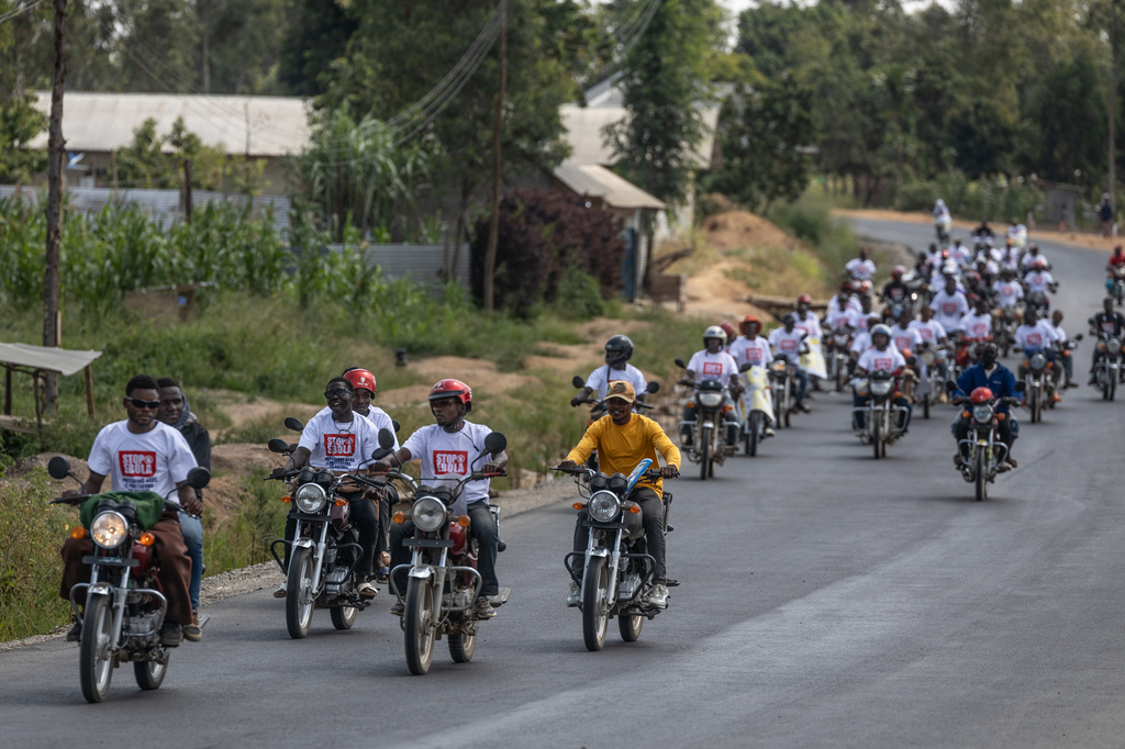 Motorcyclists join an awareness campaign organized by the World Health Organization (WHO) to combat Ebola in Bunia, Congo, Wednesday, June 10, 2026. (AP Photo/Moses Sawasawa)