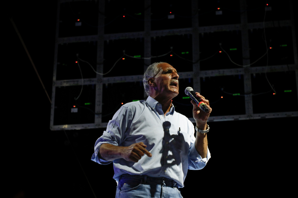 FILE - National Party presidential candidate Nasry Asfura speaks to supporters during a closing campaign rally, in Tegucigalpa, Honduras, Nov. 21, 2021. (AP Photo/Elmer Martinez, File)