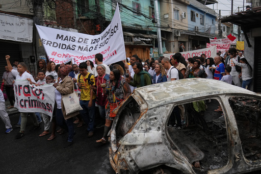 People protest days after a deadly police operation targeting a drug trafficking gang at the Complexo da Penha favela in Rio de Janeiro, Friday, Oct. 31, 2025. (AP Photo/Silvia Izquierdo) People protest days after a deadly police operation targeting a drug trafficking gang at the Complexo da Penha favela in Rio de Janeiro, Friday, Oct. 31, 2025. (AP Photo/Silvia Izquierdo)