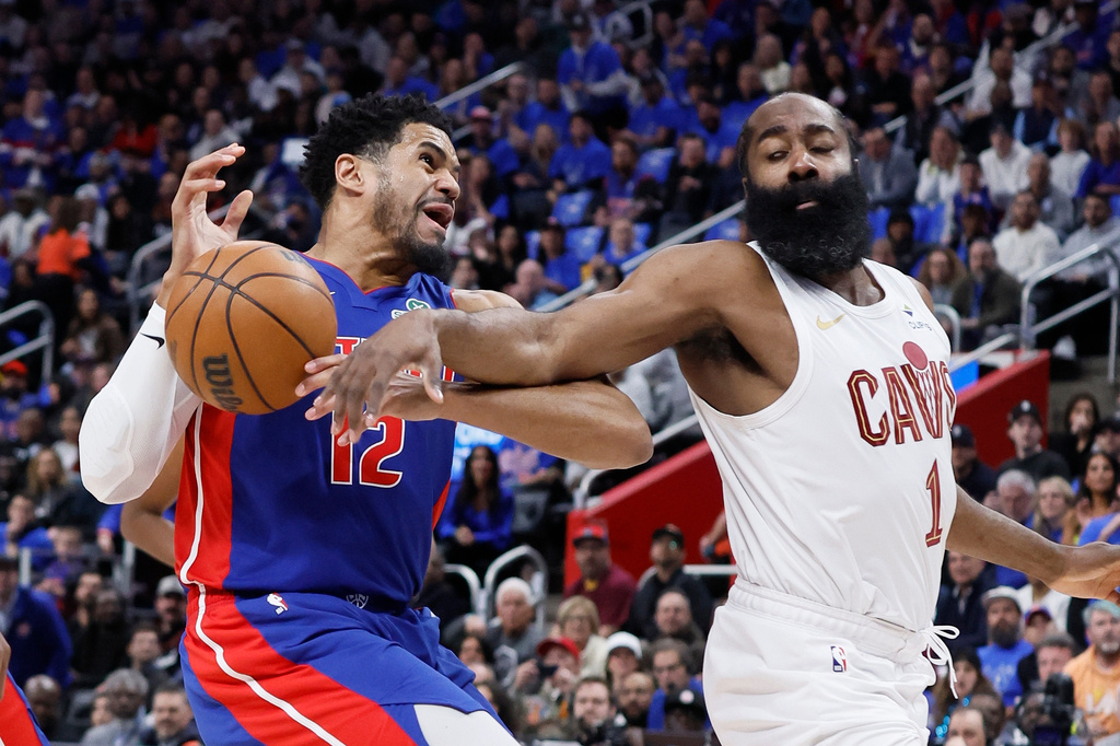 Cleveland Cavaliers guard James Harden (1) knocks the ball out of the hands of Detroit Pistons forward Tobias Harris (12) while going to the basket during the first half in Game 5 of a second-round NBA playoffs basketball series Wednesday, May 13, 2026, in Detroit. (AP Photo/Duane Burleson)