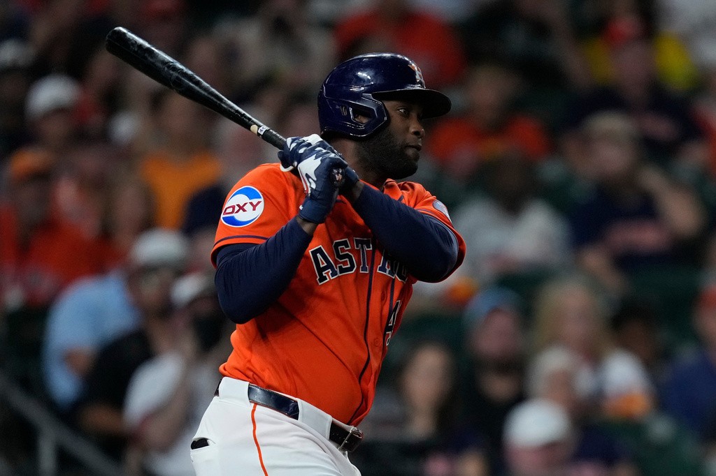 Houston Astros' Yordan Alvarez watches his RBI double during the fifth inning of a baseball game against the Athletics, Friday, Aug. 21, 2026, in Houston. (AP Photo/Kevin M. Cox)