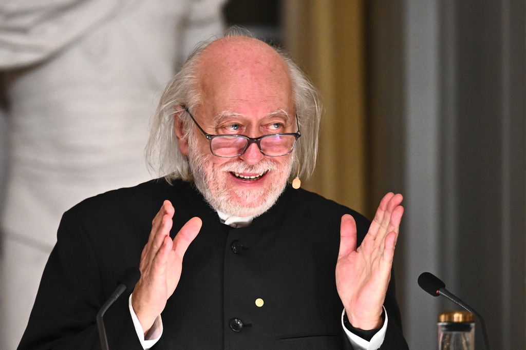 Laszlo Krasznahorkai, Nobel Prize laureate in Literature, delivers his Nobel Prize lecture in Stockholm, Sweden, Sunday Dec. 7, 2025. (Claudio Bresciani/TT News Agency via AP)