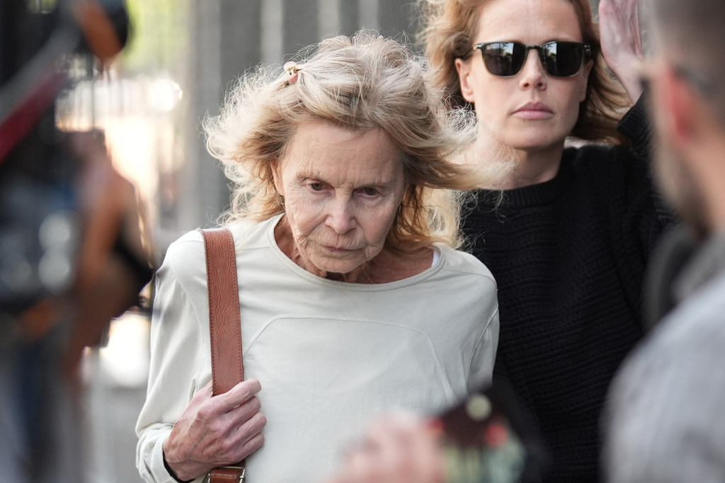 FILE - Suzanne Morrison, mother of Matthew Perry, leaves the court in Los Angeles on Wednesday, April 8, 2026, after a federal judge handed down a sentence of 15 years in prison to Jasveen Sangha, who pleaded guilty to selling "Friends" star Perry the ketamine that killed him in a 2023 overdose. (AP Photo/Damian Dovarganes, File)