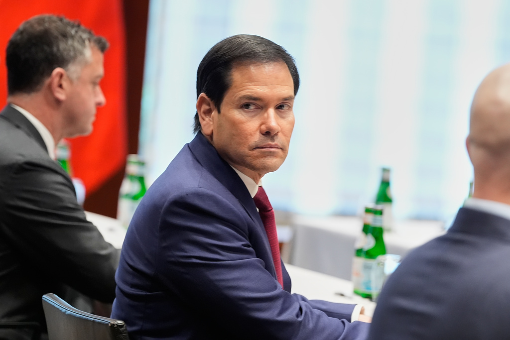Secretary of State Marco Rubio looks on during a meeting with China's Foreign Minister Wang Yi in Munich, Germany, Friday, Feb. 13, 2026, on the sidelines of the Munich Security Conference. (AP Photo/Alex Brandon, Pool)