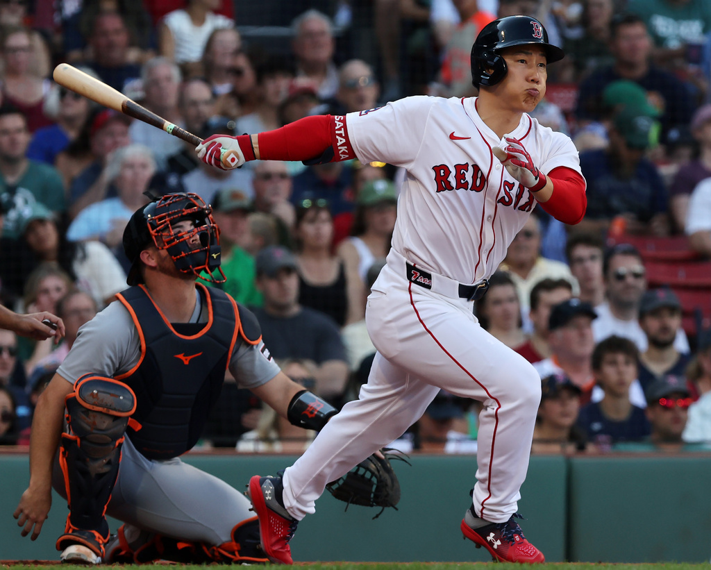Boston Red Sox's Masataka Yoshida hits a first-inning home run during a baseball game against the Detroit Tigers, Sunday, Sept. 28, 2025, in Boston. (AP Photo/Jim Davis)