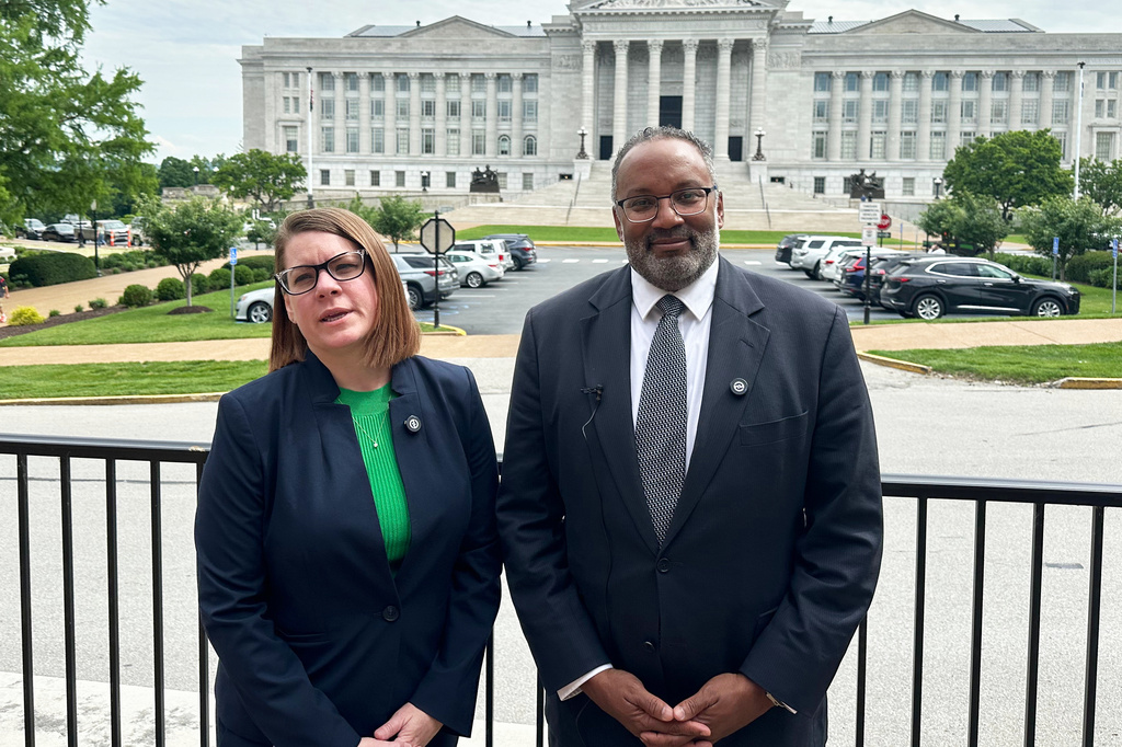 Attorney Sharon Geuea Jones, left, and Nimrod Chapel Jr., president of the Missouri state conference of the NAACP, talk to reporters outside the Missouri state Capitol on Wednesday, May 27, 2026, in Jefferson City, Missouri. (AP Photo/David A. Lieb)