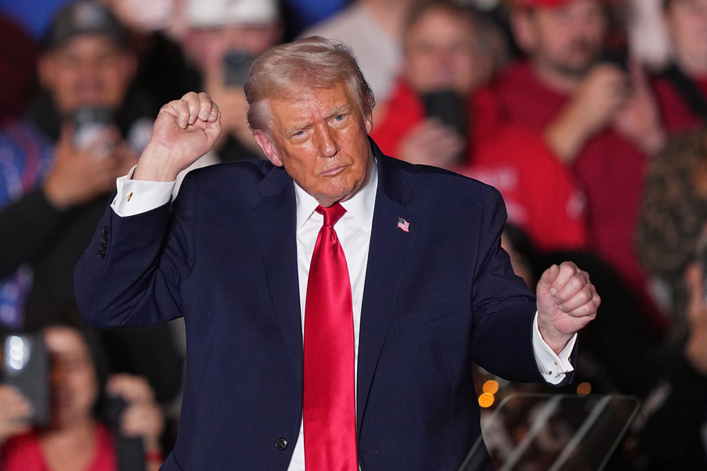 President Donald Trump dances to music after speaking at the Mount Airy Casino Resort in Mount Pocono, Pa., Tuesday, Dec. 9, 2025. (AP Photo/Matt Rourke)