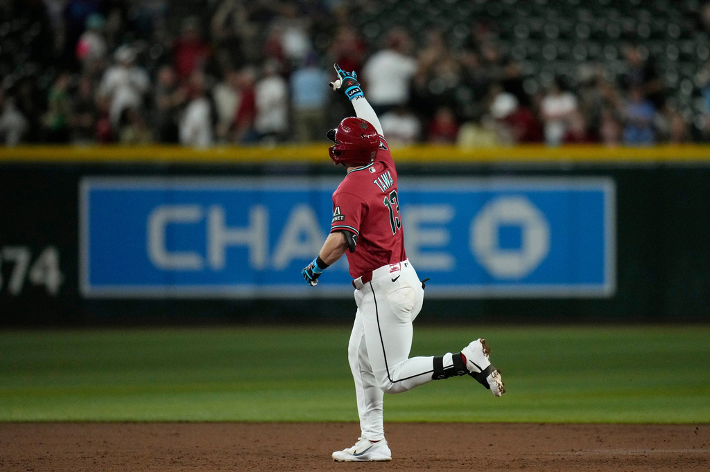 Arizona Diamondbacks' Tim Tawa rounds the bases after hitting a home run against the San Diego Padres during the third inning of a baseball game, Wednesday, Aug. 5, 2026, in Phoenix. (AP Photo/Ross D. Franklin)