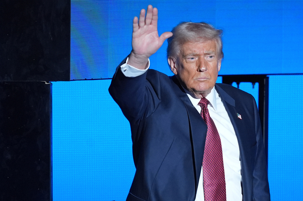 President Donald Trump on stage after speaking at the America Business Forum, Wednesday, Nov. 5, 2025, in Miami. (AP Photo/Rebecca Blackwell)