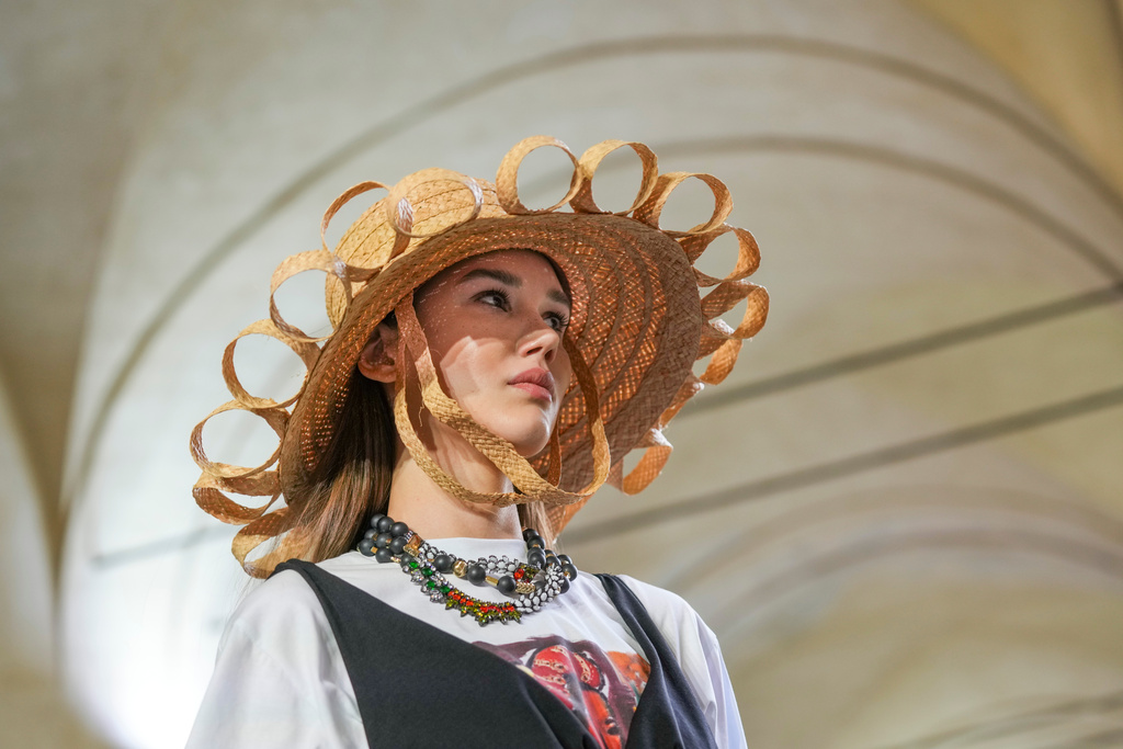 A model wears a creation as part of the Stella Jean's Spring/Summer 2026 collection presented in Milan, Italy, Saturday, Sept. 27, 2025. (AP Photo/Antonio Calanni)