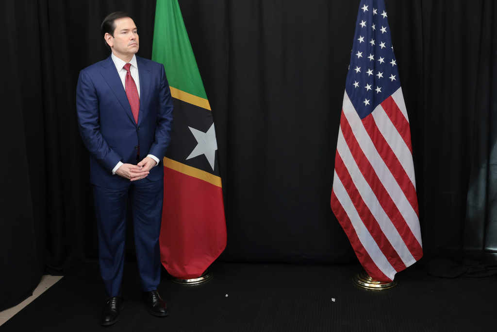 U.S. Secretary of State Marco Rubio waits to meet with St. Kitts and Nevis Prime Minister Terrance Drew in Basseterre, Saint Kitts and Nevis, which is hosting the Caribbean Community (CARICOM) meeting, Wednesday, Feb. 25, 2026. (Jonathan Ernst/Pool photo via AP)