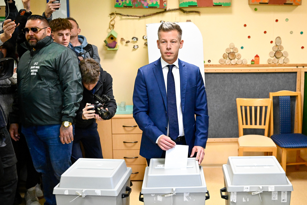 Peter Magyar, leader of the opposition Tisza party, casts his ballot at a polling station in Budapest, Hungary, Sunday, April 12, 2026. (AP Photo/Denes Erdos)