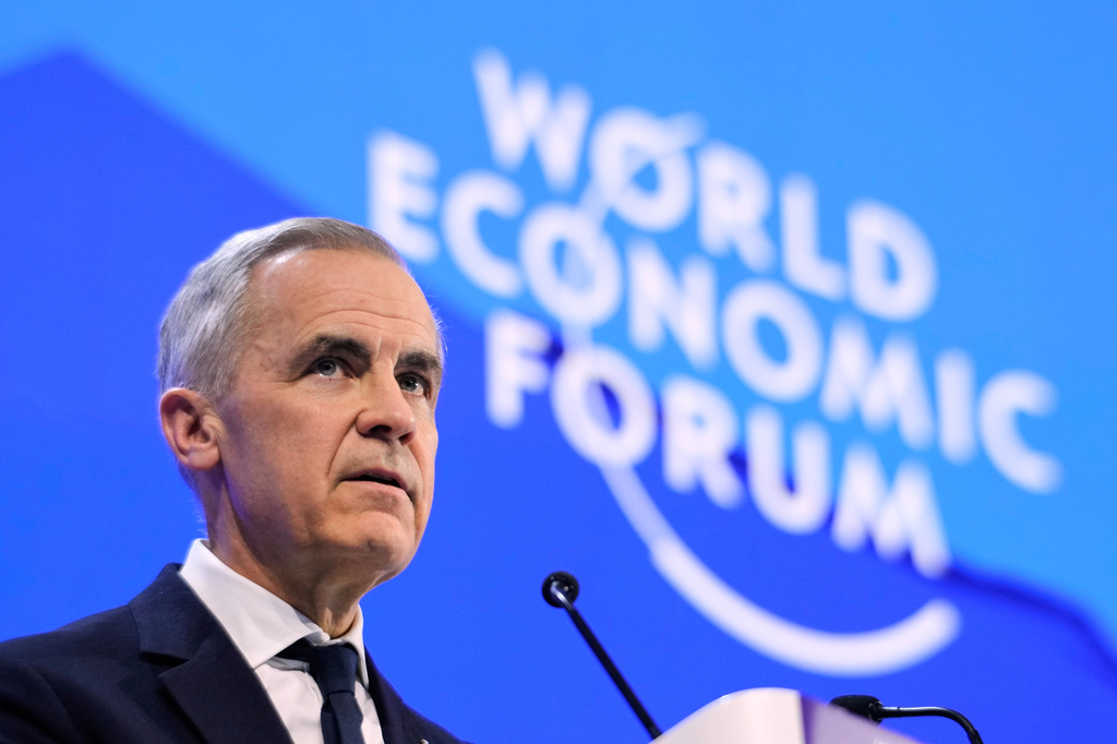 FILE - Canada's Prime Minister Mark Carney speaks during the Annual Meeting of the World Economic Forum in Davos, Switzerland, Jan. 20, 2026. (AP Photo/Markus Schreiber, File)