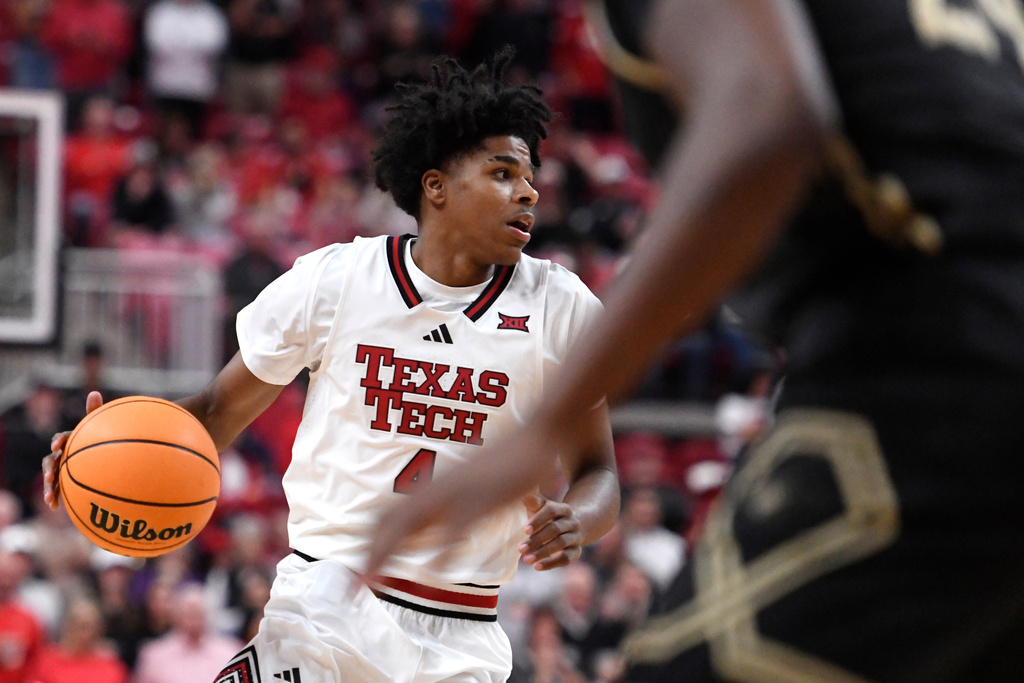 Texas Tech guard Christian Anderson (4) dribbles the ball during the first half in an NCAA college basketball game against Lindenwood, Tuesday, Nov. 4, 2025, in Lubbock, Texas. (AP Photo/Annie Rice)