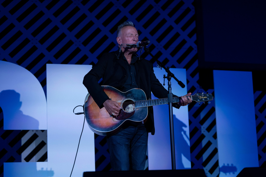 Bruce Springsteen performs on stage after recieving the ACLU Ralph Ellison Award for Defenders of Civil Rights and Civil Liberties in the Arts, Business, Science, and Sports at the ACLU's 2026 Biennial Leadership Conference,Friday, July 24, 2026, in Washington. (AP Photo/Kevin Wolf)