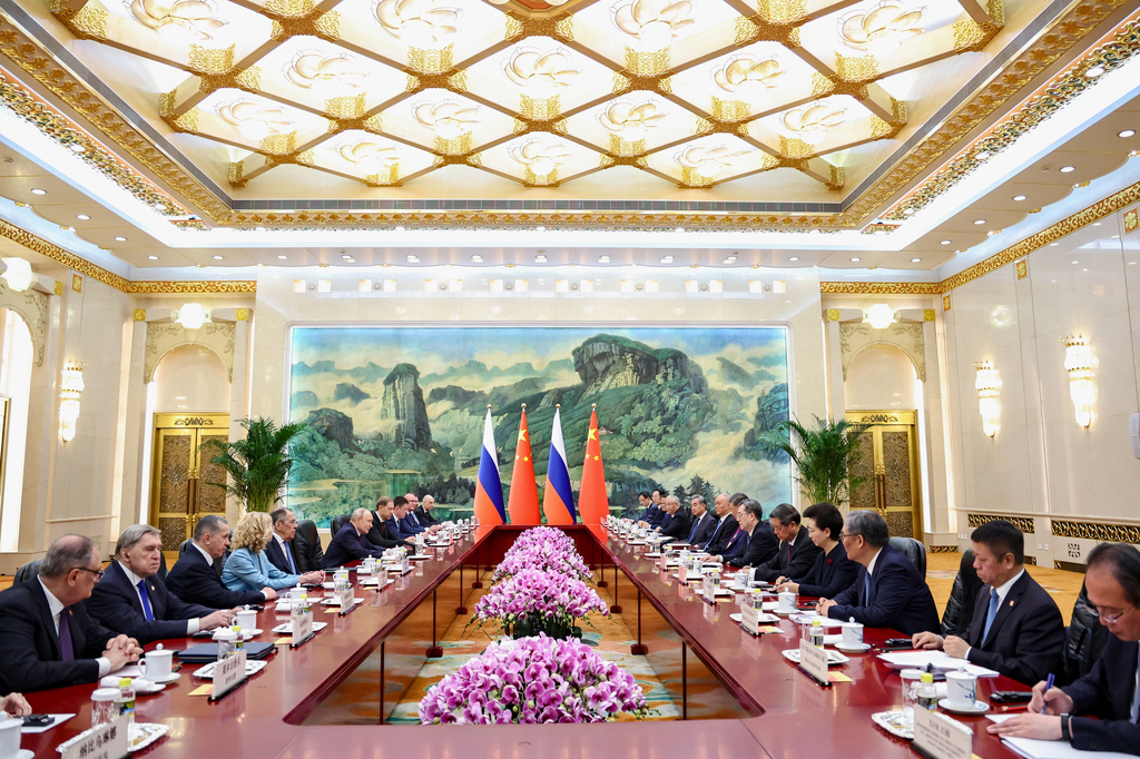 Russian President Vladimir Putin and Chinese President Xi Jinping attend a bilateral meeting at the Great Hall of the People, in Beijing, China, on Wednesday, May 20, 2026. (Alexander Kazakov, Sputnik, Kremlin Pool Photo via AP)