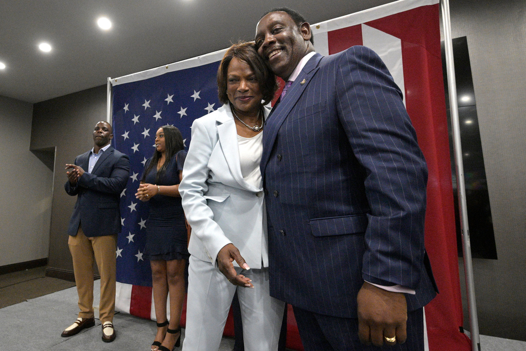 FILE - Rep. Val Demings, D-Fla., the Democratic candidate for the U.S. Senate, receives a hug from her husband, Orange County Mayor Jerry Demings, right, after thanking supporters during a primary election party on Aug. 23, 2022, in Orlando, Fla. (AP Photo/Phelan M. Ebenhack, File)