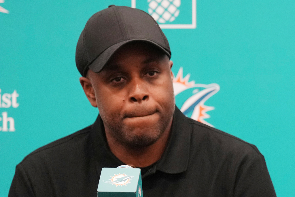 Miami Dolphins general manager Chris Grier listens questions during an NFL football press conference, Friday, April 25, 2025, in Miami Gardens, Fla. (AP Photo/Jim Rassol, File)