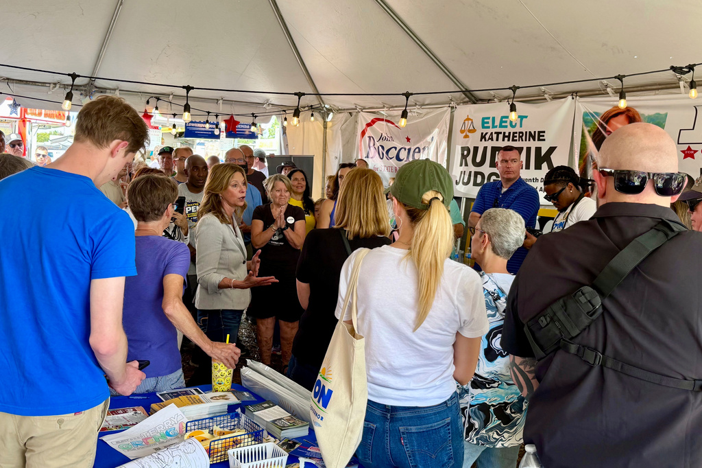 This photo provided by Mike Ray shows Ohio gubernatorial candidate Amy Acton talking to supporters on Sunday, Sept. 6, at the Canfield Fair in Canfield, Ohio. (Mike Ray via AP)