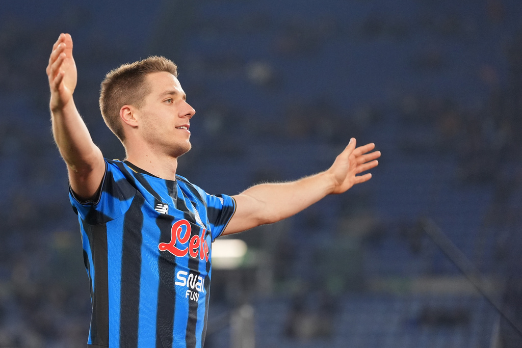 Atalanta's Mario Pasalic celebrates after scoring during the Frecciarossa Italian Cup soccer match between Lazio and Atalanta in, Rome, Italy, Wednesday March 4, 2026. (Alfredo Falcone/LaPresse via AP)