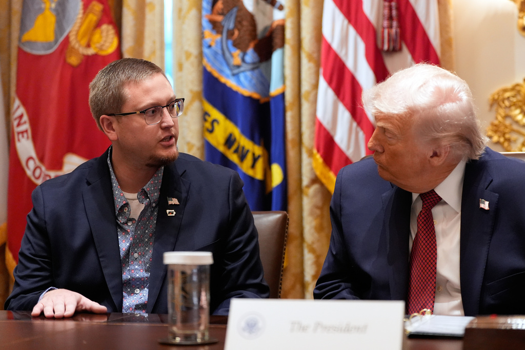President Donald Trump listens as Cordt Holub of Dysart, Iowa, speaks during a roundtable on farm subsidies in the Cabinet Room of the White House, Monday, Dec. 8, 2025, in Washington. (AP Photo/Alex Brandon)