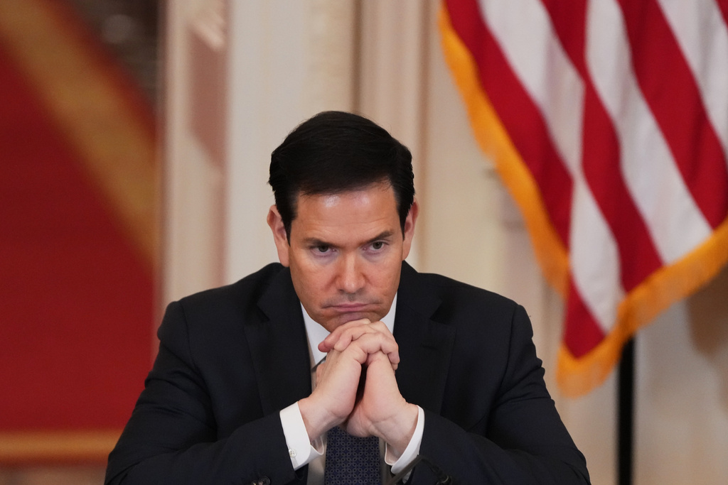 Secretary of State Marco Rubio listens during a roundtable discussion on college sports in the East Room of the White House, Friday, March 6, 2026, in Washington. (AP Photo/Julia Demaree Nikhinson)
