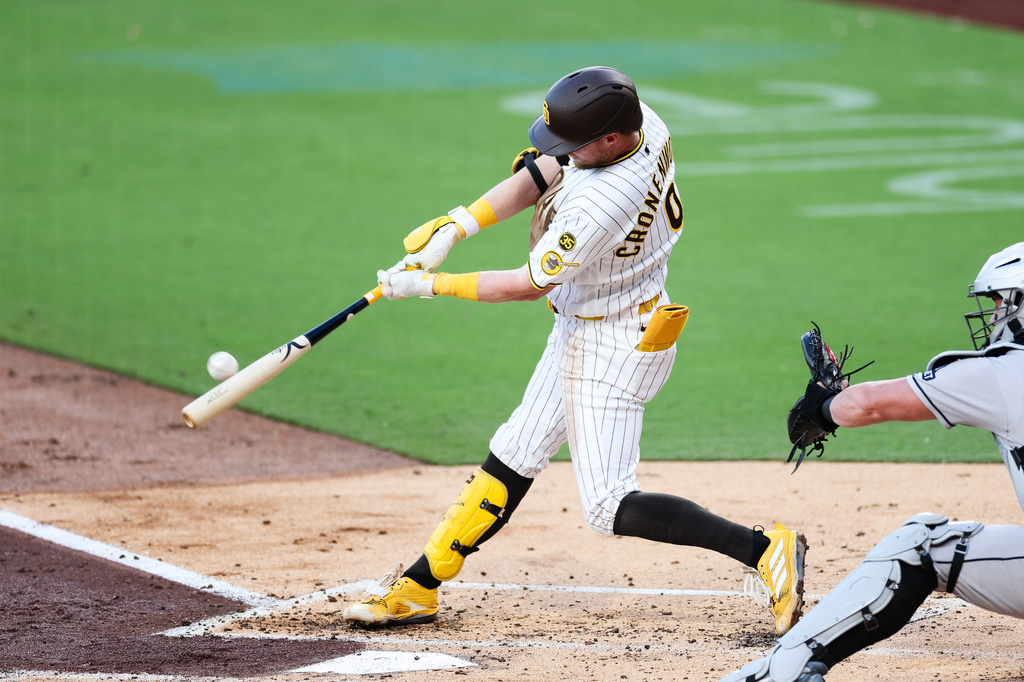 San Diego Padres' Jake Cronenworth hits a three-run home run against the Arizona Diamondbacks in the first inning of a baseball game Tuesday, July 7, 2026, in San Diego. (AP Photo/Derrick Tuskan)